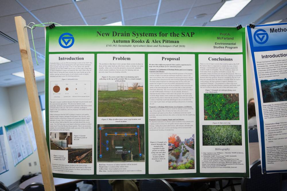 A student project poster on display.